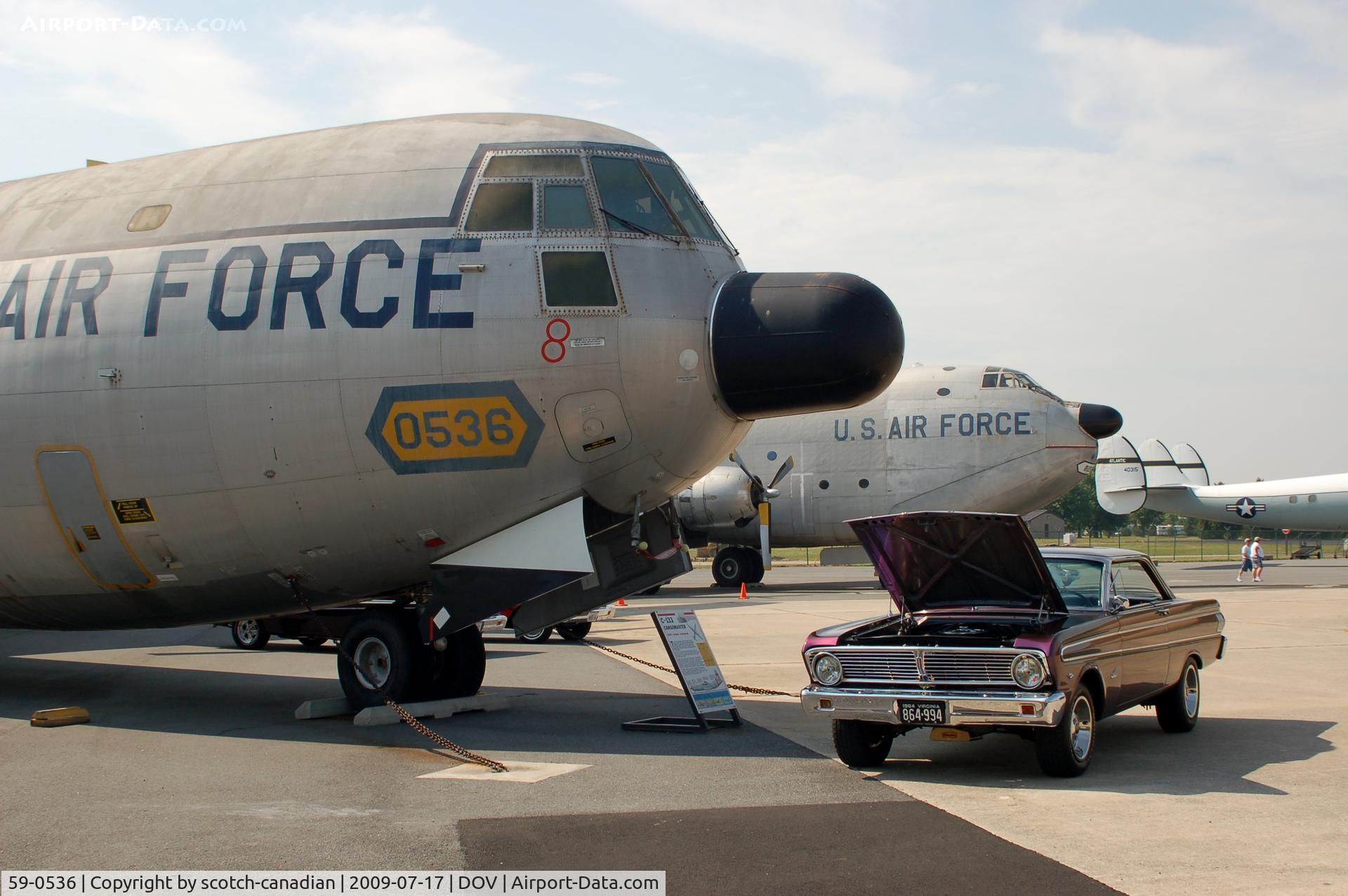 59-0536, 1961 Douglas C-133B-DL Cargomaster C/N 45587, 1959 Douglas C-133B-DL Cargomaster and a Ford Falcon at the Air Mobility Command Museum, Dover AFB, DE