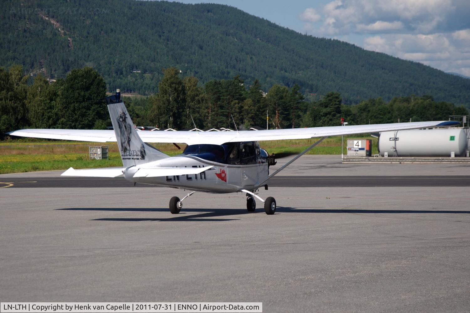 LN-LTH, Cessna 182E Skylane C/N 182-54027, Cessna 182E Skylane taxying on the platform of Notodden airfield, Norway. Note the artwork on its tail.