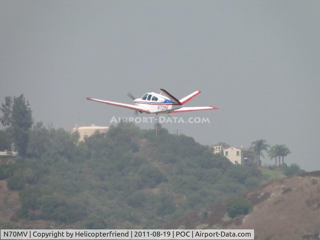 N70MV, 1979 Beech V35B Bonanza C/N D-10222, Headed west into a smoggy day with wheels retracted