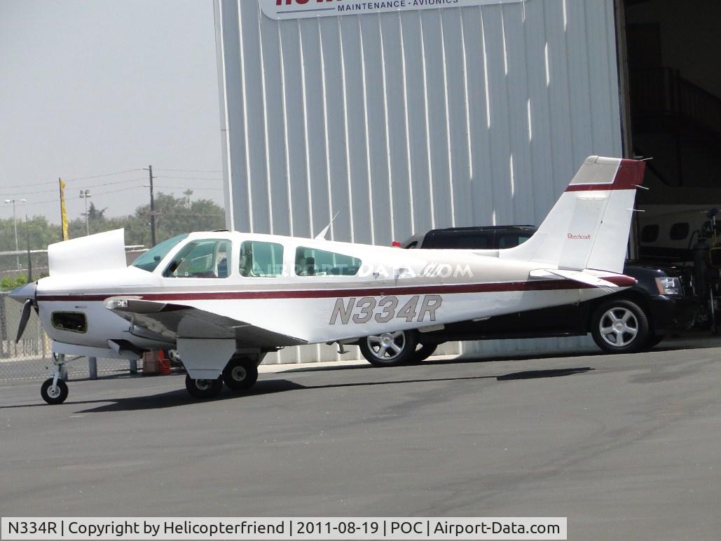 N334R, 1991 Beech F33A Bonanza C/N CE-1561, Parked at Howard Aviation with engine cowling open