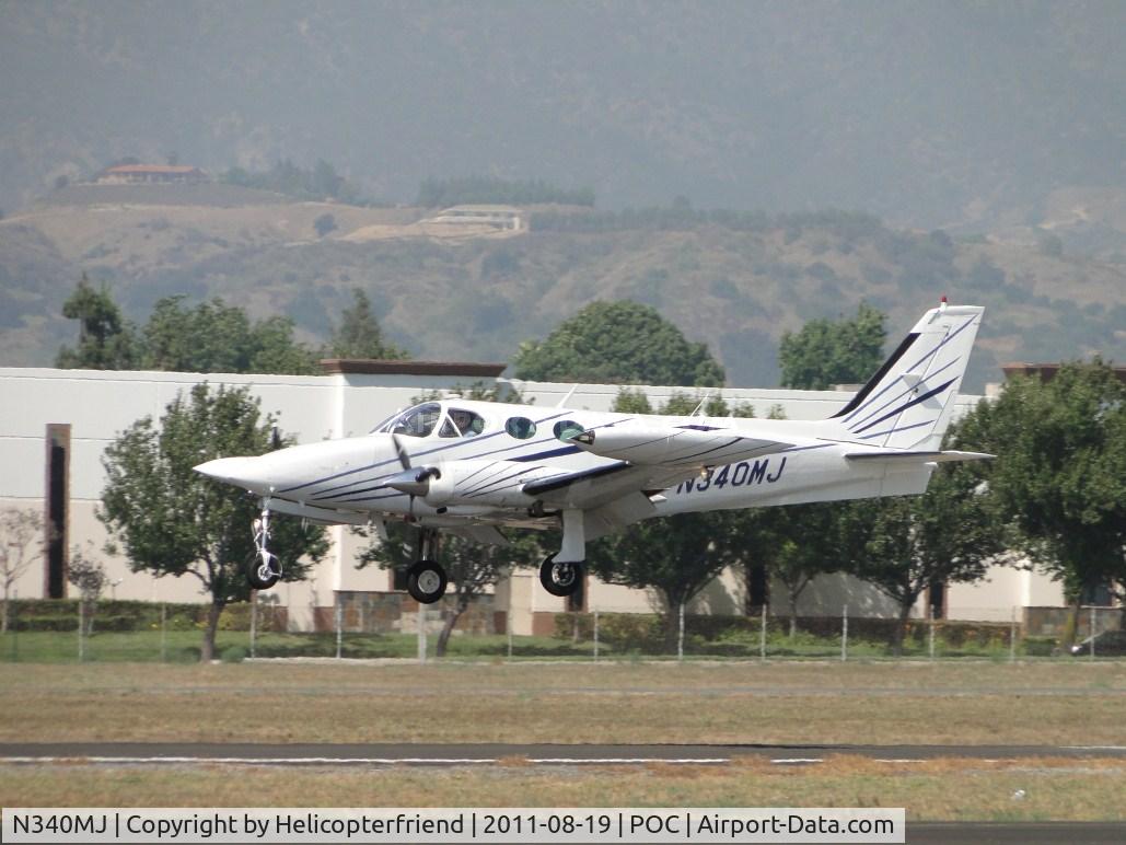 N340MJ, 1993 Cessna 340A C/N 340A1521, Almost down on runway 26L
