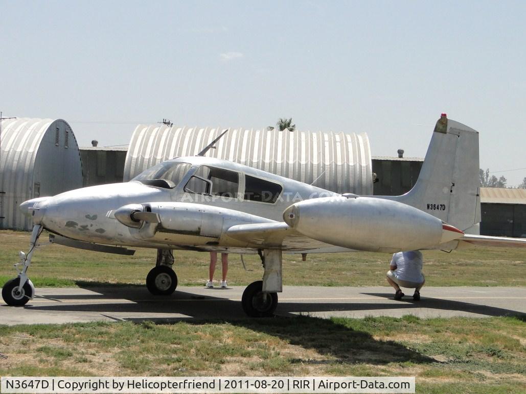 N3647D, 1956 Cessna 310 C/N 35347, Parked north of the runway and getty ready to taxi