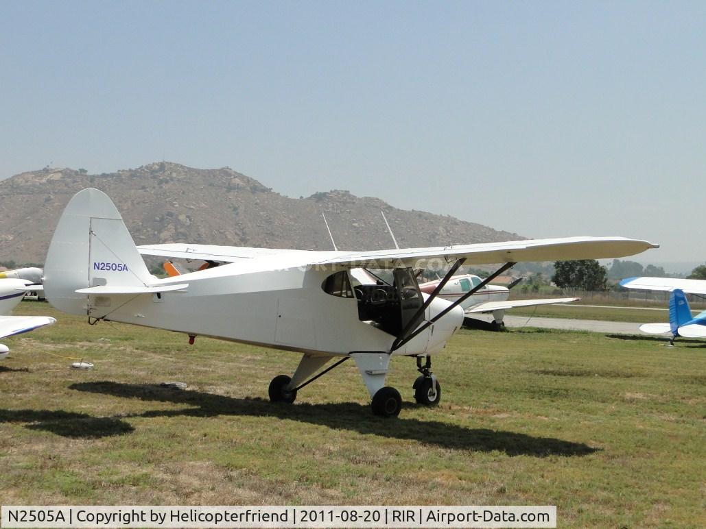 N2505A, 1952 Piper PA-22-135 Tri-Pacer C/N 22-816, Parked in the grass, with door open to try and cool things off