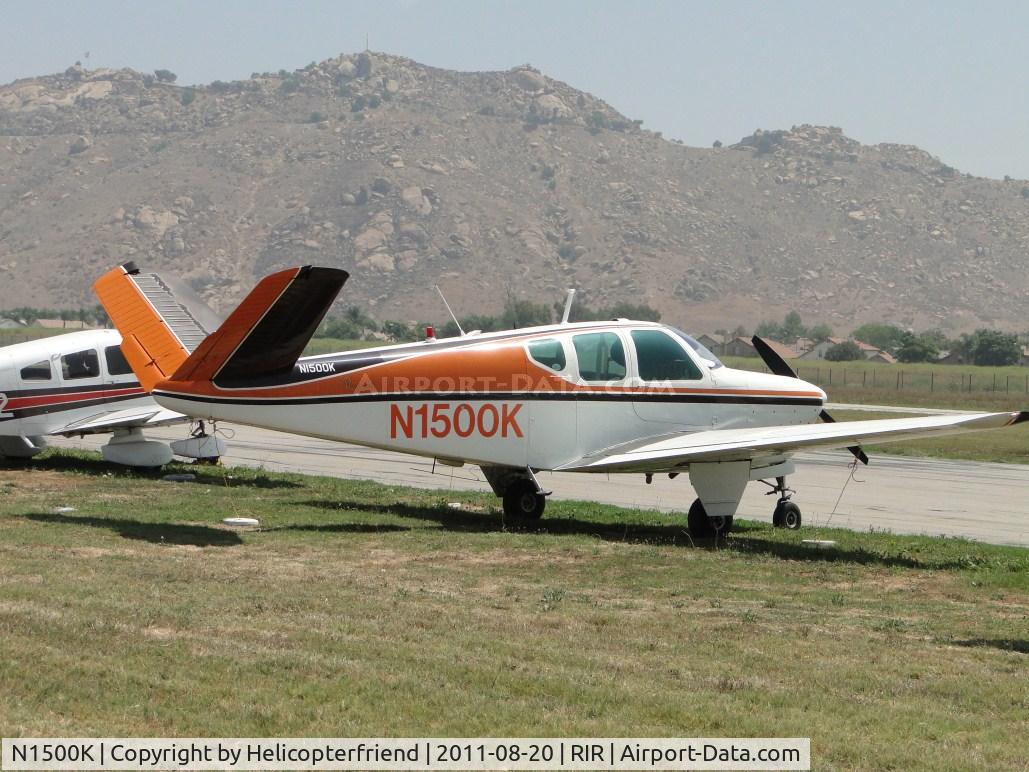 N1500K, 1959 Beech K35 Bonanza C/N D-5871, Parked in the grass