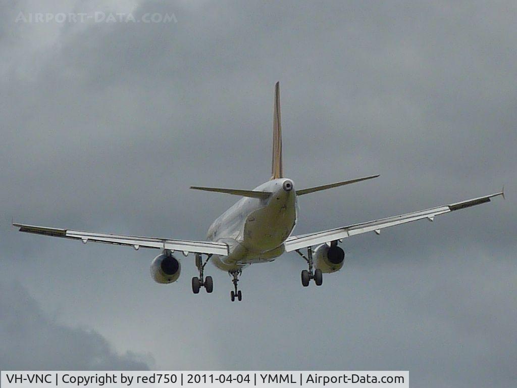 VH-VNC, 2007 Airbus A320-232 C/N 3275, VH-VNC over the fence on approach to runway 16 at Tullamarine