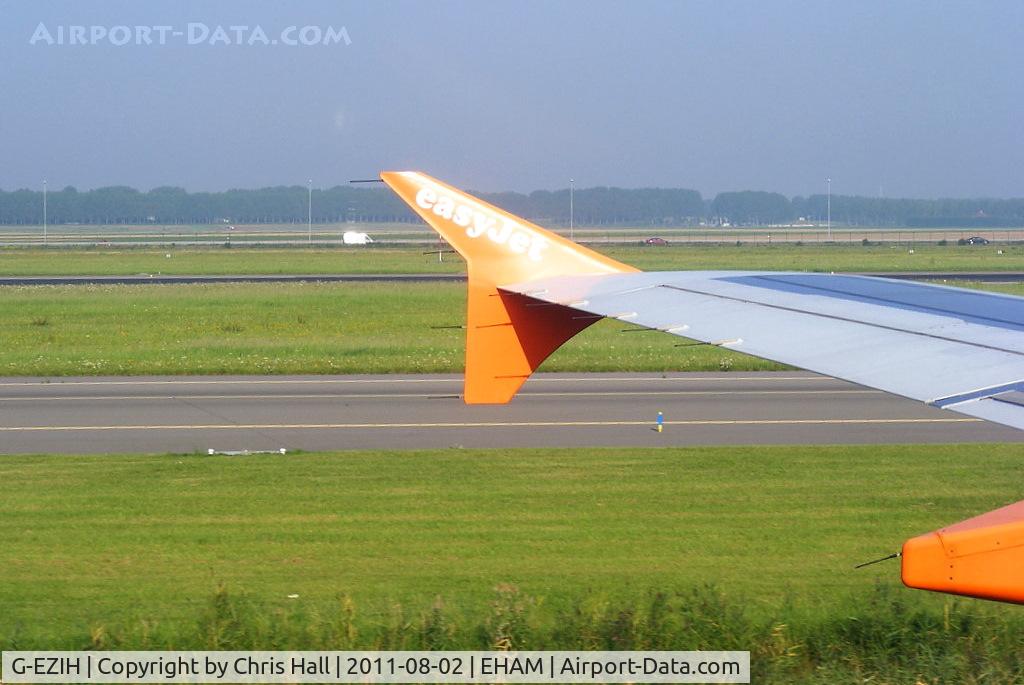 G-EZIH, 2005 Airbus A319-111 C/N 2463, arriving at Schiphol after our flight from Liverpool