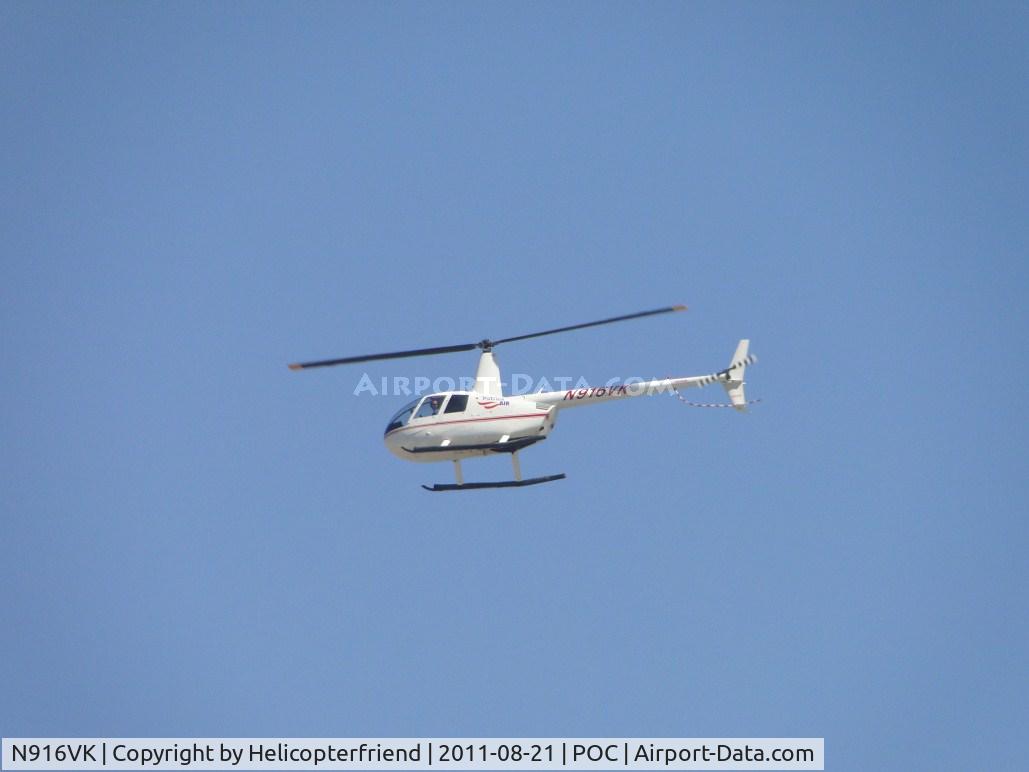 N916VK, 2006 Robinson R44 II C/N 11162, Shooting landings on runway 26R and left seat is looking at aircraft display area