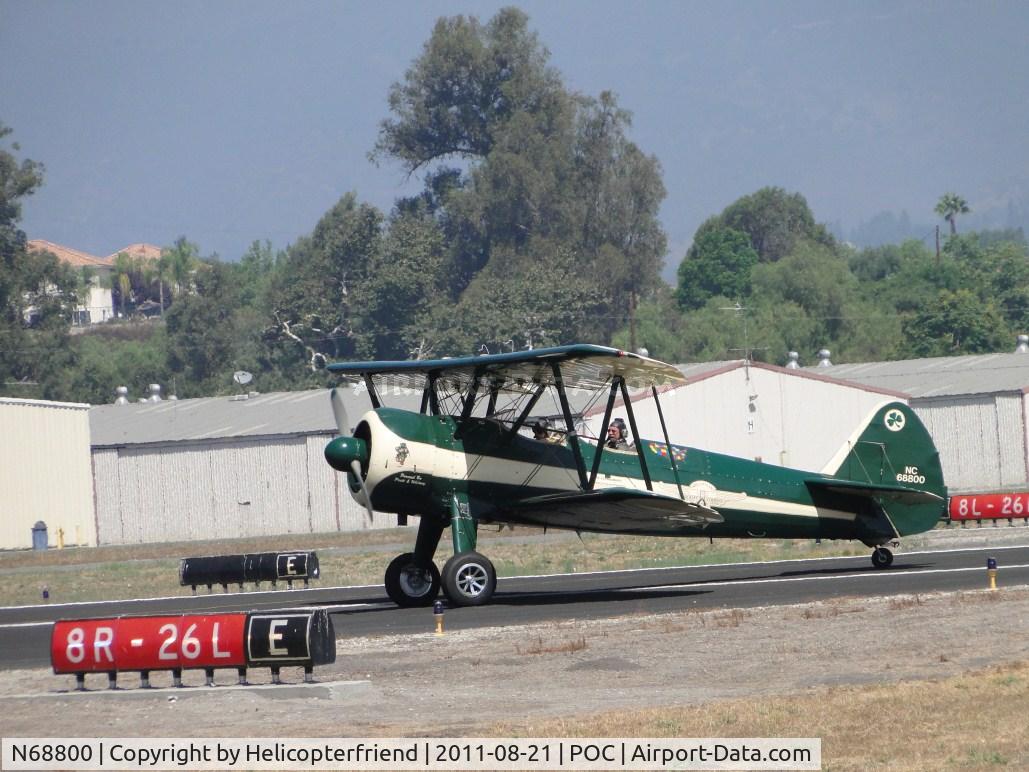 N68800, 1941 Boeing B75N1 C/N 75-1694, Arriving on runway 26L and taxiing to display area