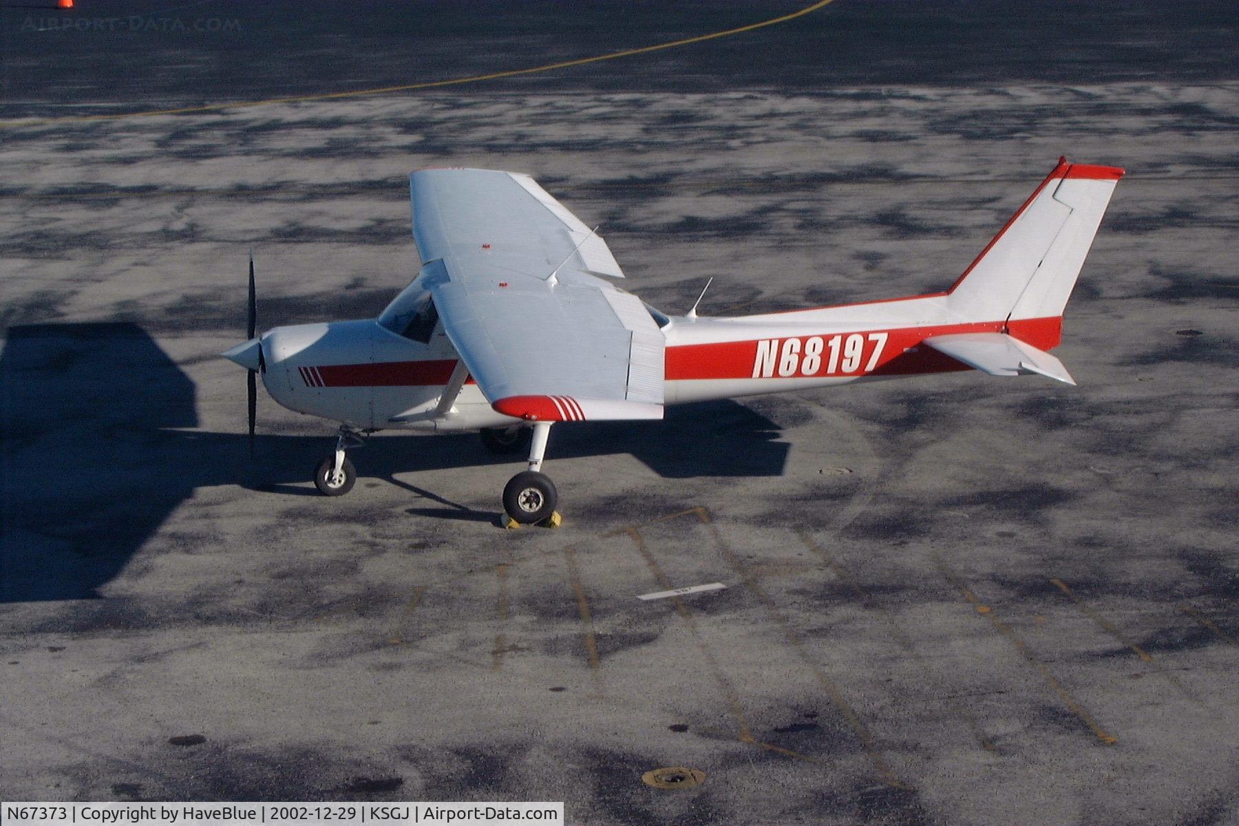 N67373, 1978 Cessna 152 C/N 15281789, This photo taken at St. Augustine, FL airport from the FlyBy Cafe by me in December 2002