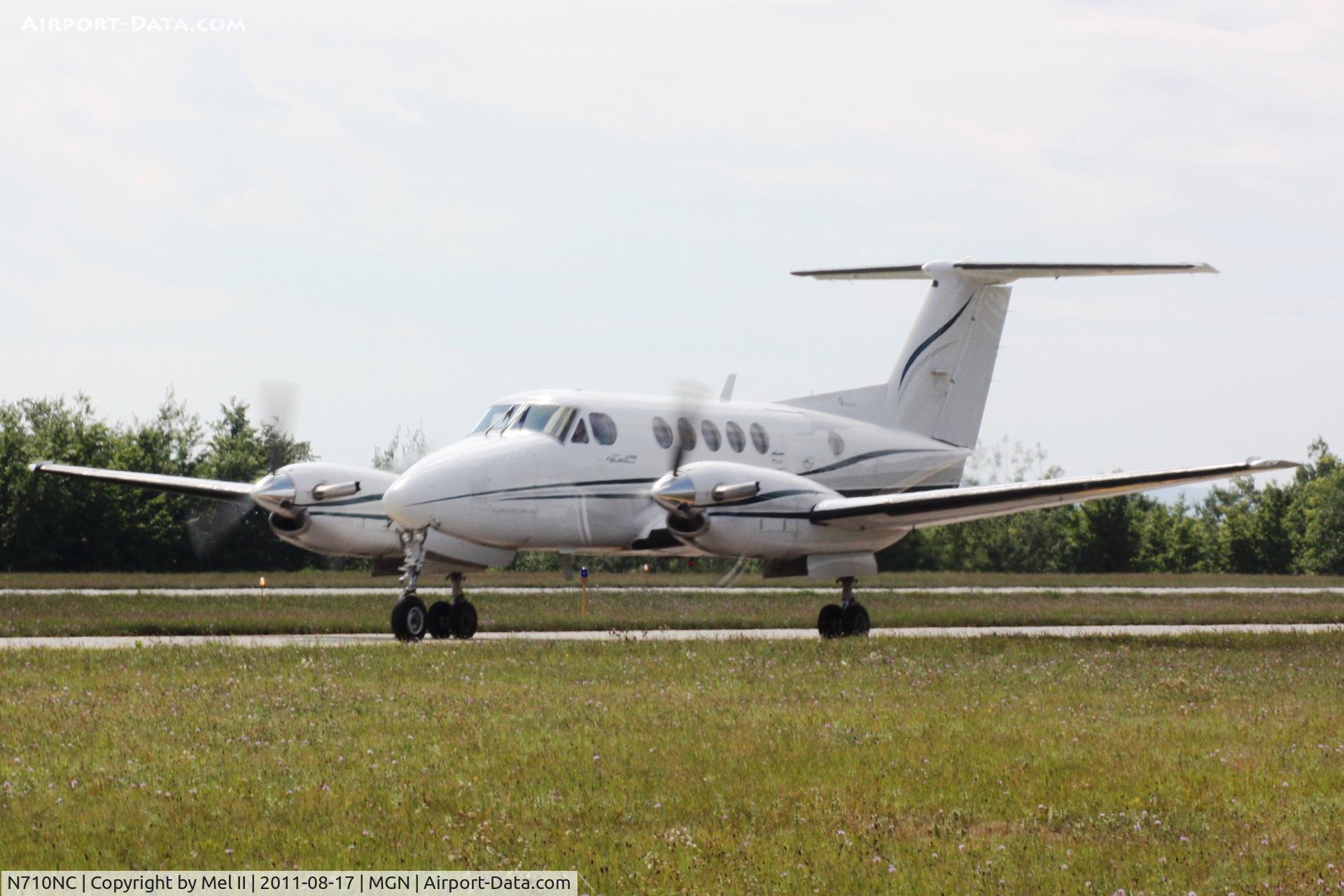 N710NC, 1977 Beech 200 C/N BB-322, NKT100 - KORD-KMGN - Taxi From Landing RWY 28