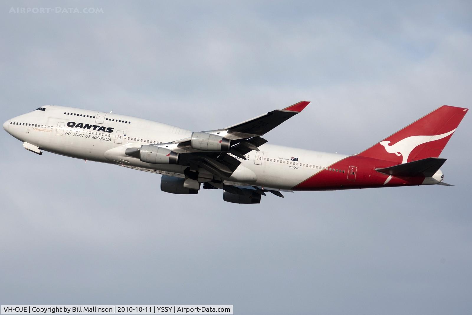 VH-OJE, 1989 Boeing 747-438 C/N 24482, up and away from 16R