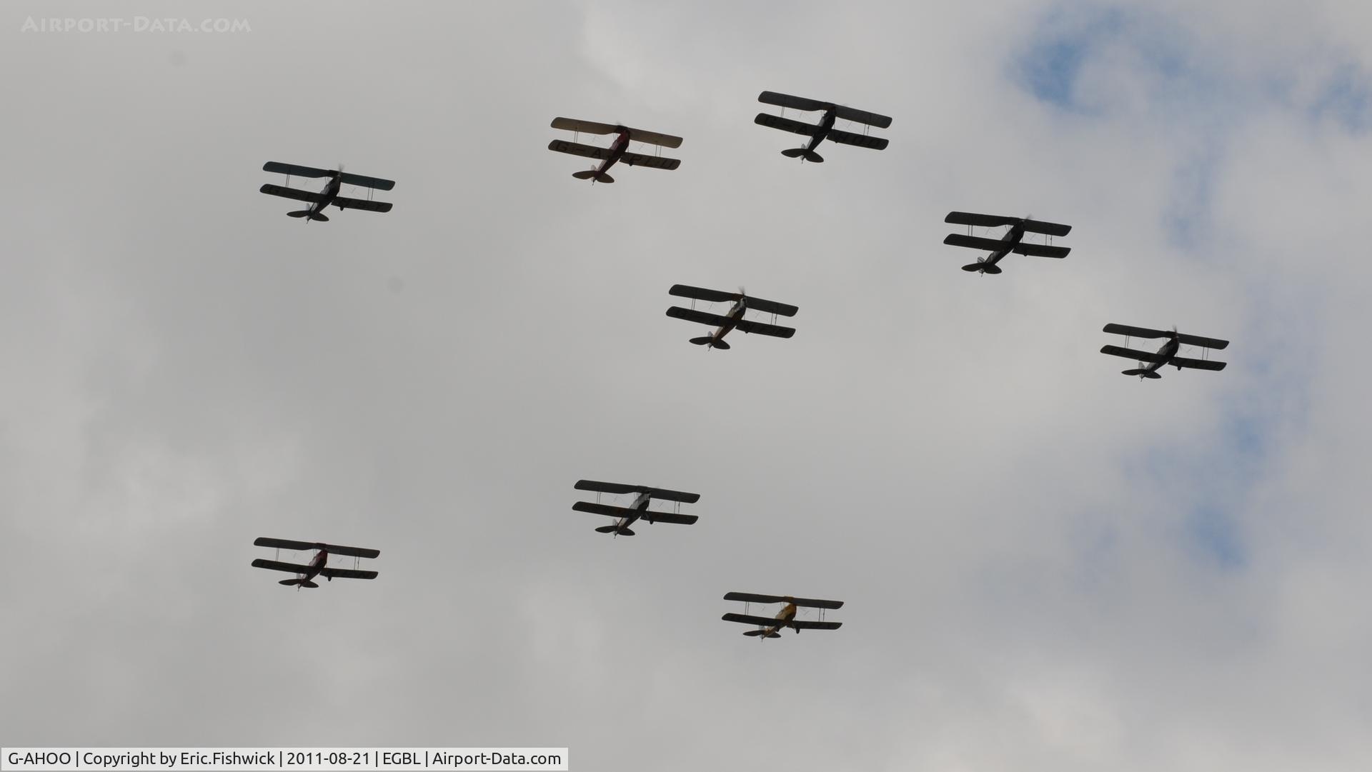 G-AHOO, 1943 De Havilland DH-82A Tiger Moth II C/N 86149, 5. G-AHOO leading the Tiger Nine Formation Team at The de Havilland Moth Club International Moth Rally, celebrating the 80th anniversary of the DH82 Tiger Moth. Held at Belvoir Castle. A most enjoyable day.