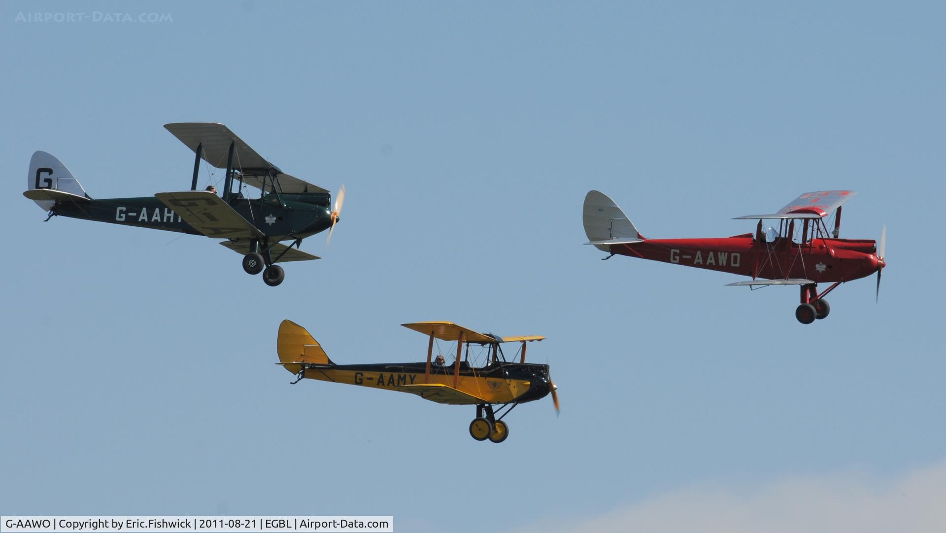 G-AAWO, 1930 De Havilland DH60G Gipsy Moth C/N 1235, 5. G-AAWO leading a trio of DH60 Moths at The de Havilland Moth Club International Moth Rally, celebrating the 80th anniversary of the DH82 Tiger Moth. Held at Belvoir Castle. A most enjoyable day.
