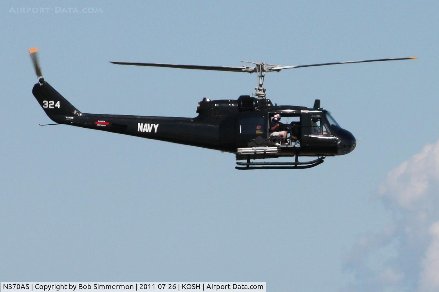 N370AS, Bell UH-1B Iroquois C/N 984, Overflying Airventure 2011.