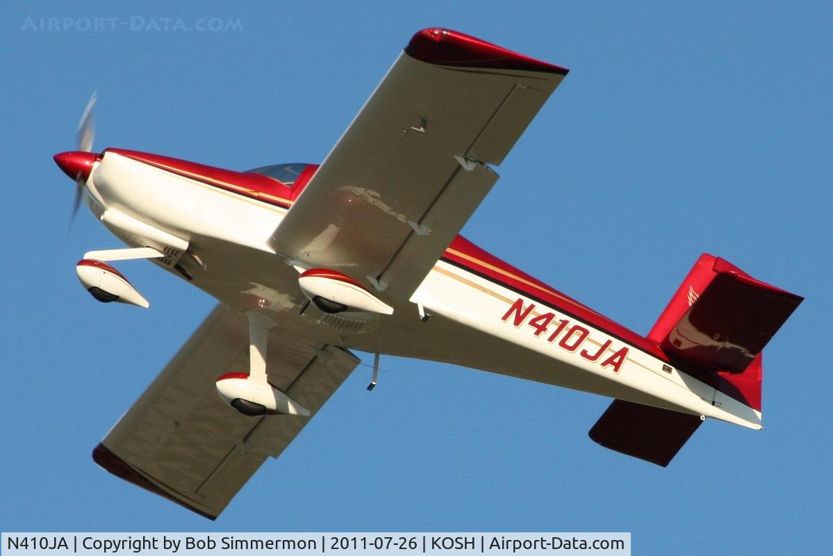 N410JA, 2006 Vans RV-10 C/N 40010, Departing Airventure 2011.