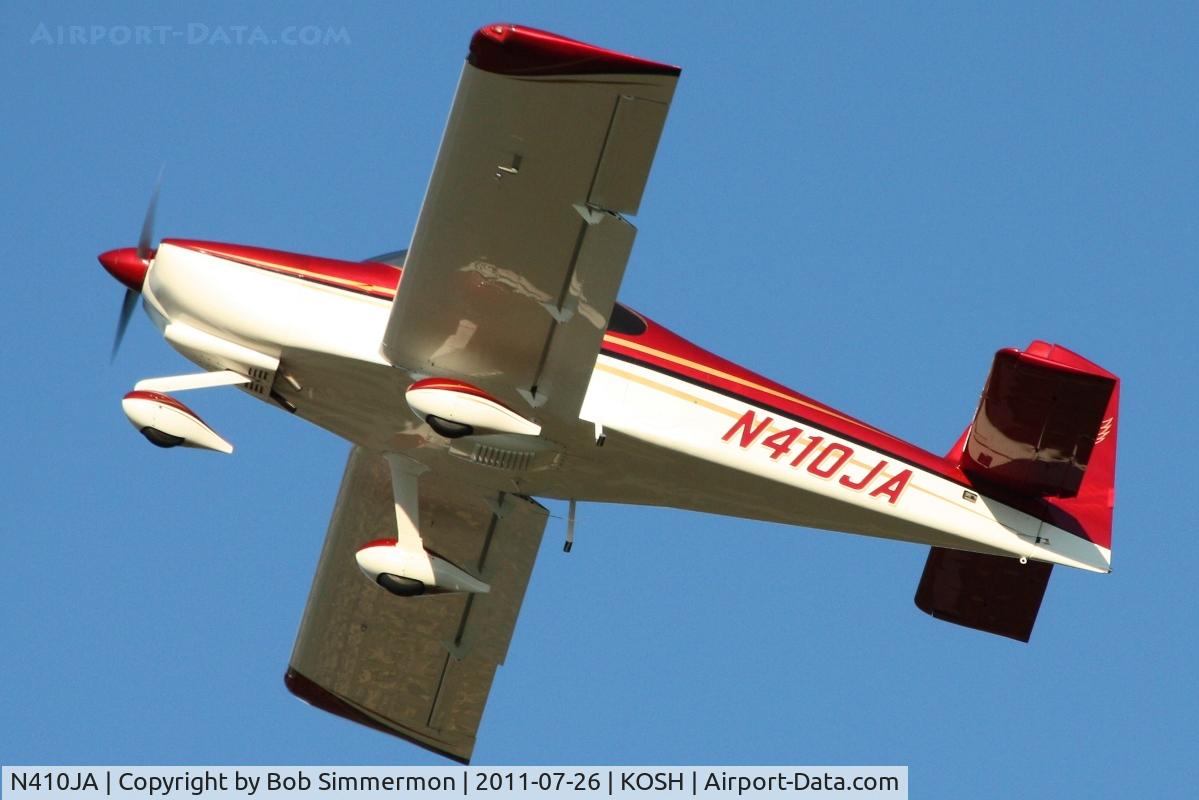 N410JA, 2006 Vans RV-10 C/N 40010, Departing Airventure 2011.