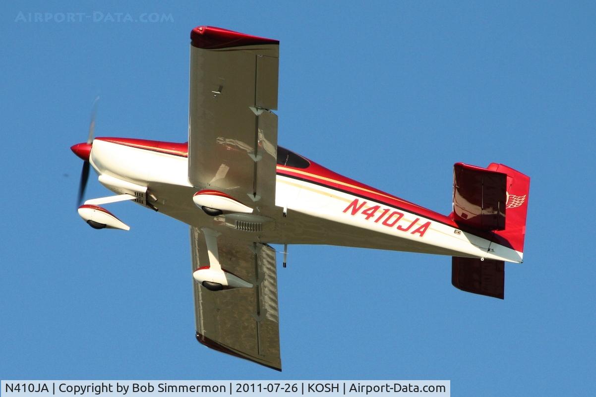 N410JA, 2006 Vans RV-10 C/N 40010, Departing Airventure 2011.