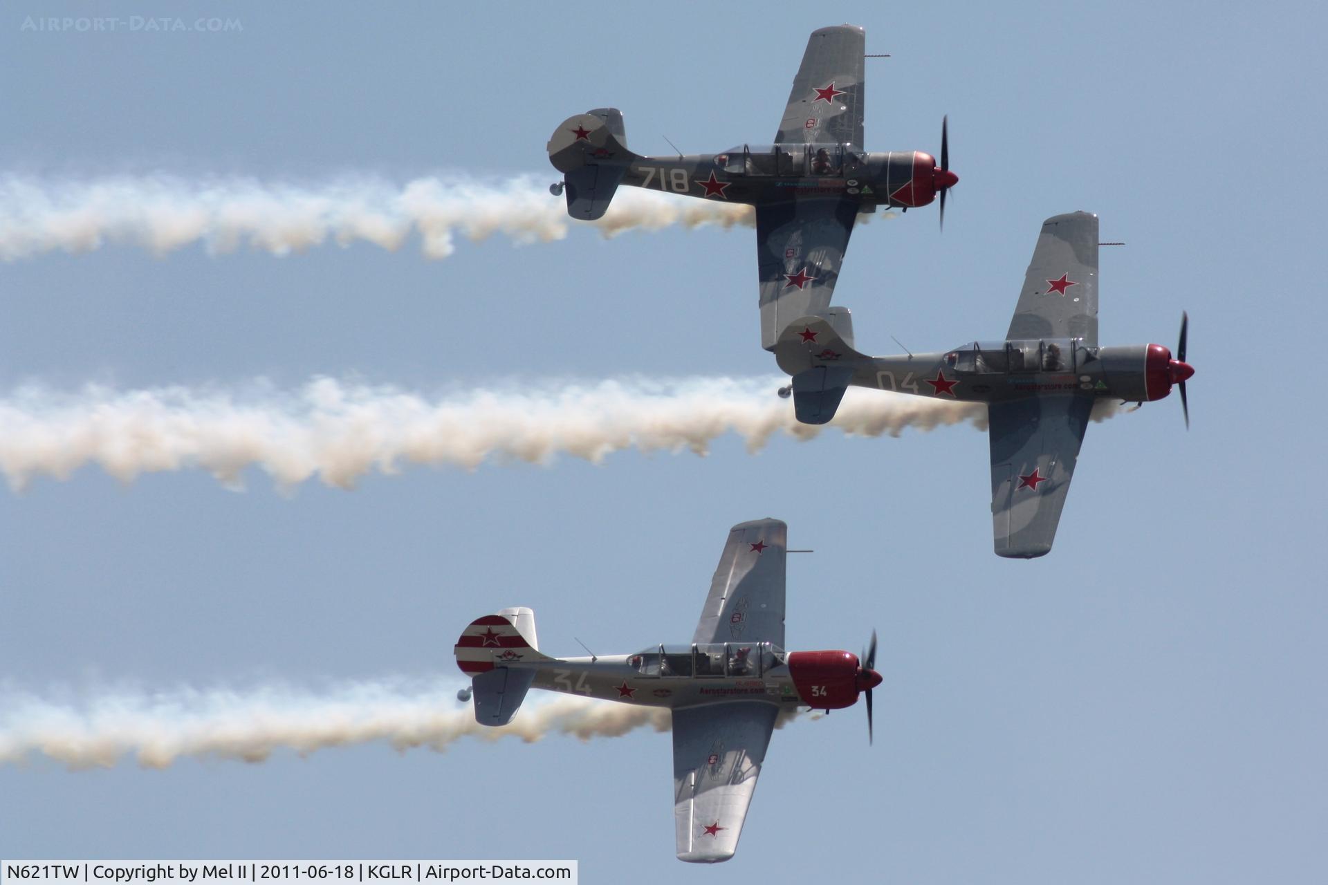 N621TW, 2003 Yakovlev (Aerostar) Yak-52TW C/N 0312504, Aerostars at 2011 Wings Over Gaylord Air Show (N252TW & N718PH)
