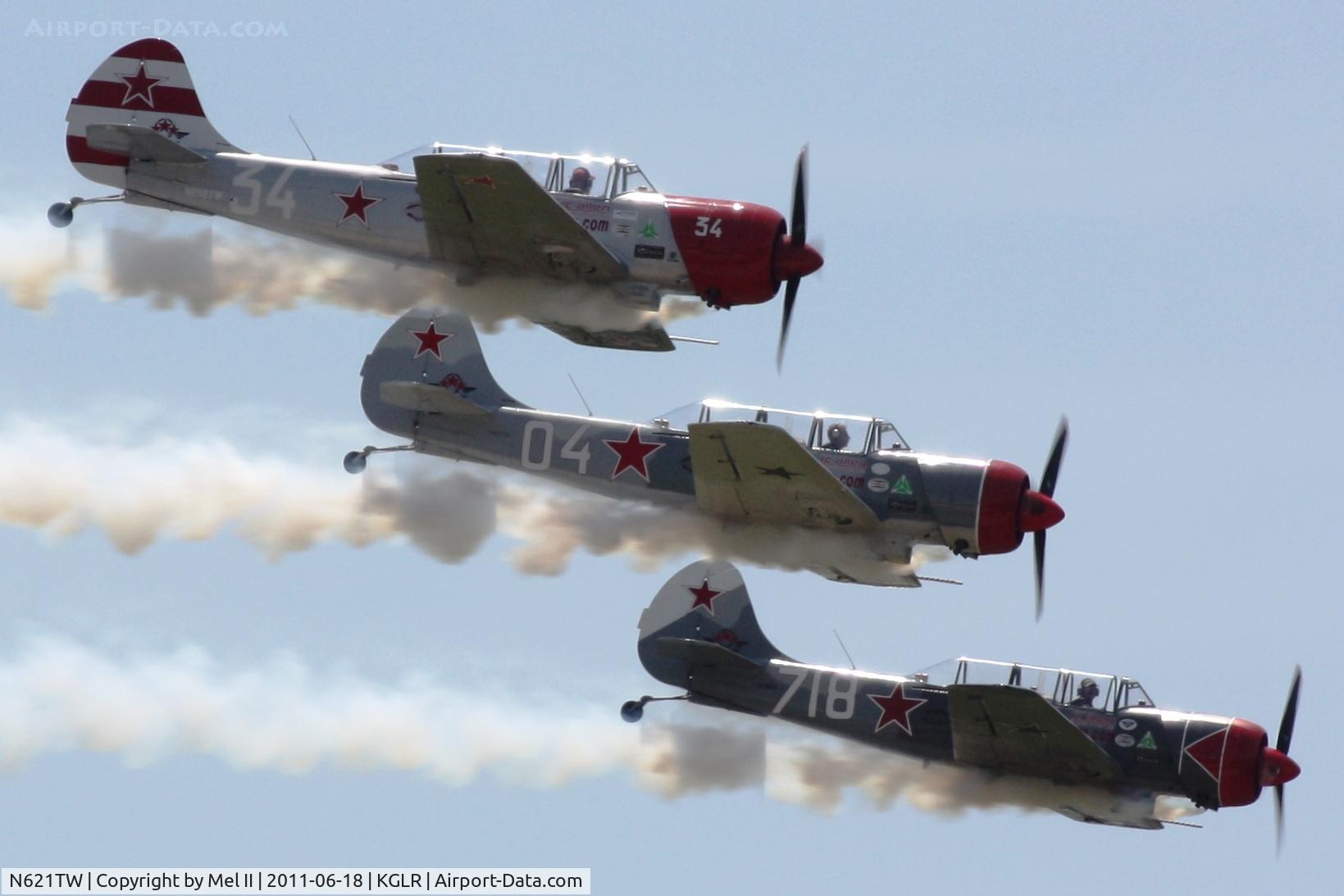 N621TW, 2003 Yakovlev (Aerostar) Yak-52TW C/N 0312504, Aerostars at 2011 Wings Over Gaylord Air Show (N252TW & N718PH)