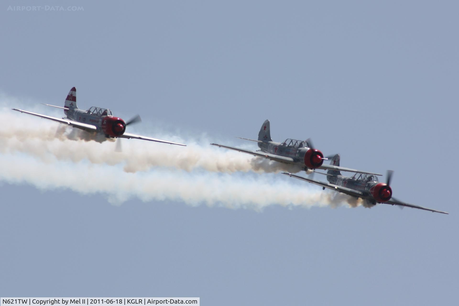 N621TW, 2003 Yakovlev (Aerostar) Yak-52TW C/N 0312504, Aerostars at 2011 Wings Over Gaylord Air Show (N252TW & N718PH)