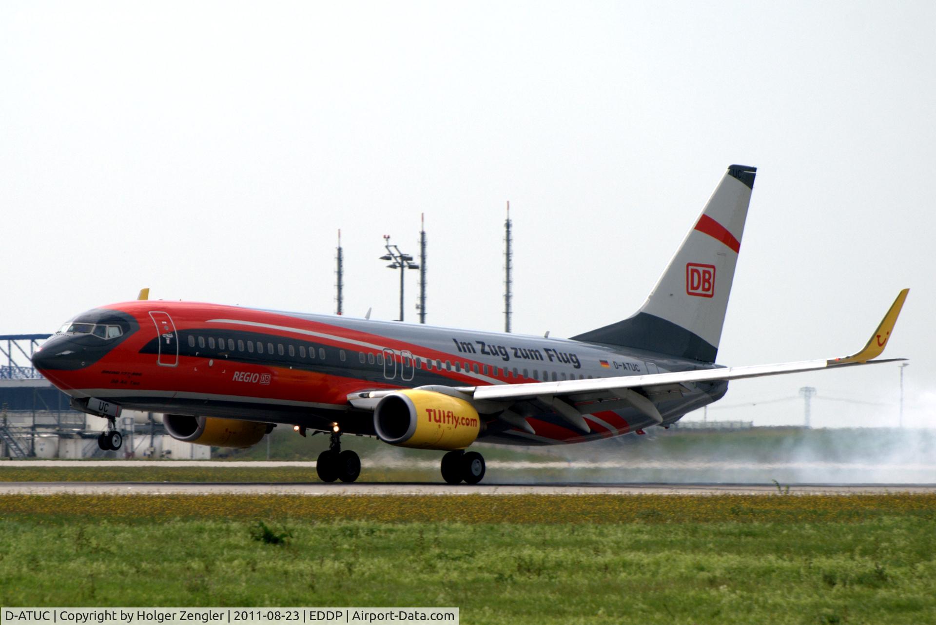 D-ATUC, 2006 Boeing 737-8K5 C/N 34684, The train pulled into the station on platform 08L :-)