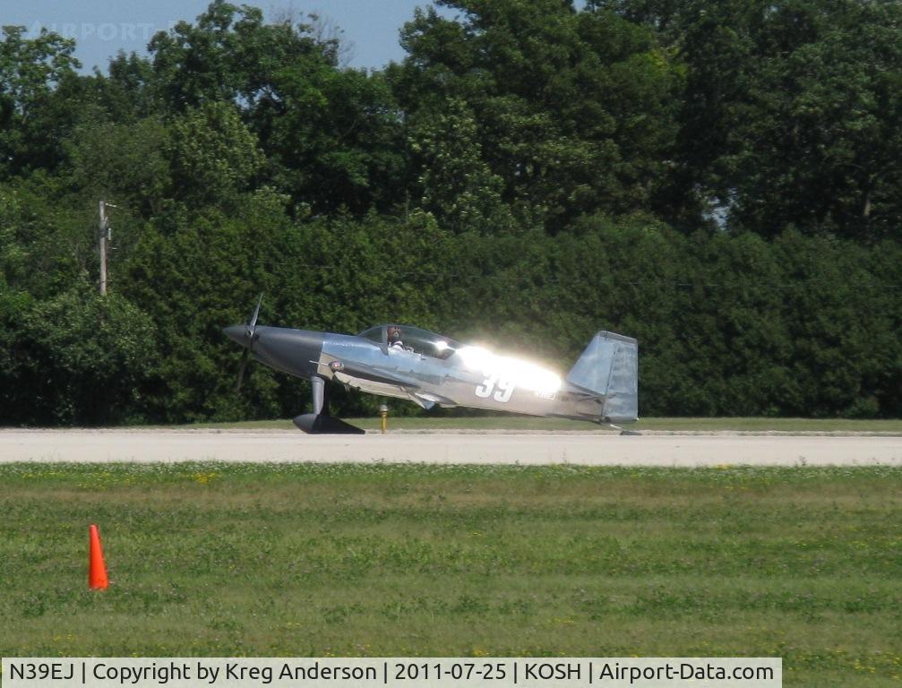 N39EJ, 2006 Team Rocket F-1 Rocket C/N 039, Unknown Vans RV departing EAA AirVenture 2011. Help identifying this aircraft would be greatly appreciated.