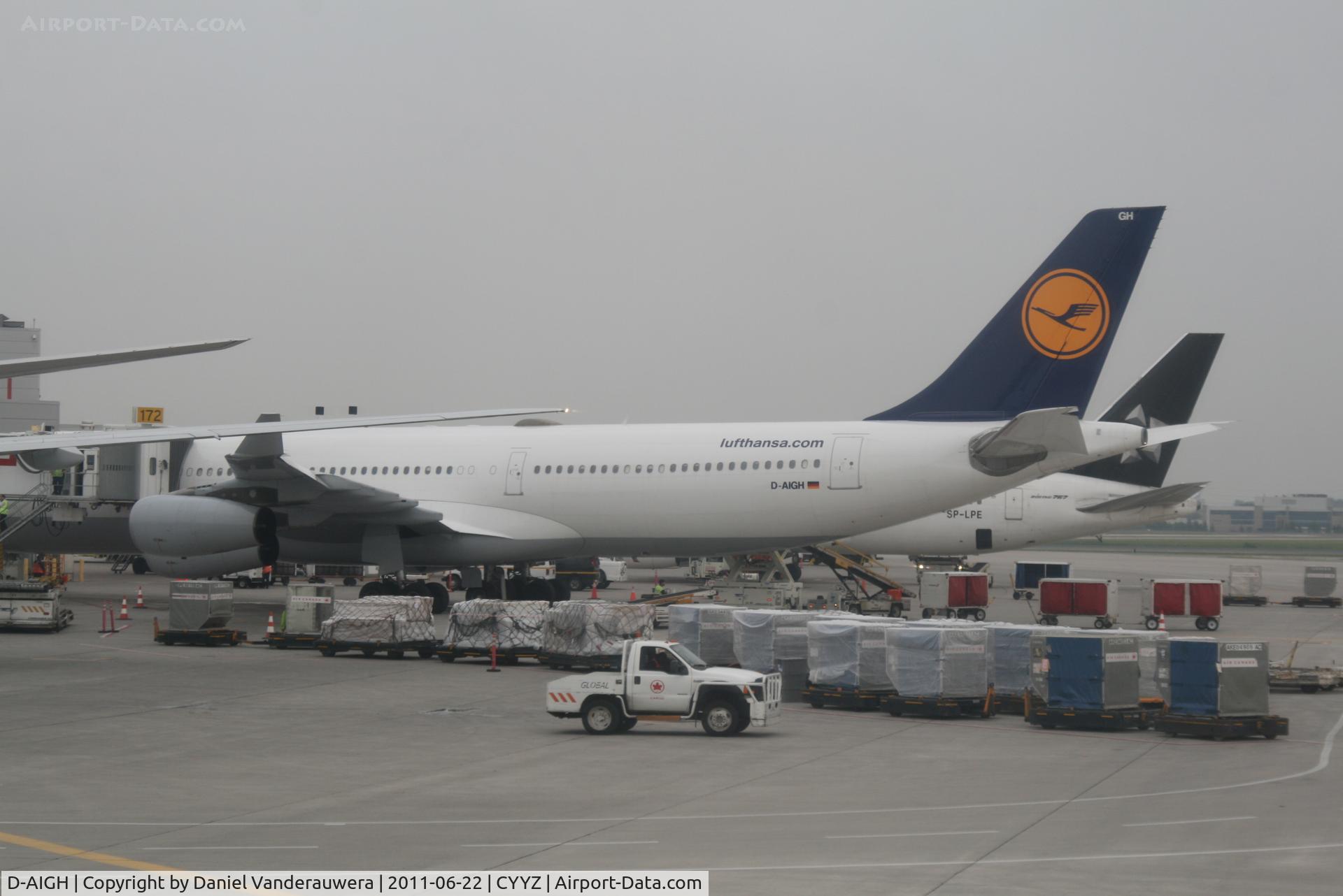 D-AIGH, 1994 Airbus A340-311 C/N 052, At the gate  -  Flight LH471  YYZ-FRA   -  Next a/c  SP-LPE  B767-341/ER   Flight LO042  YYZ-WAW