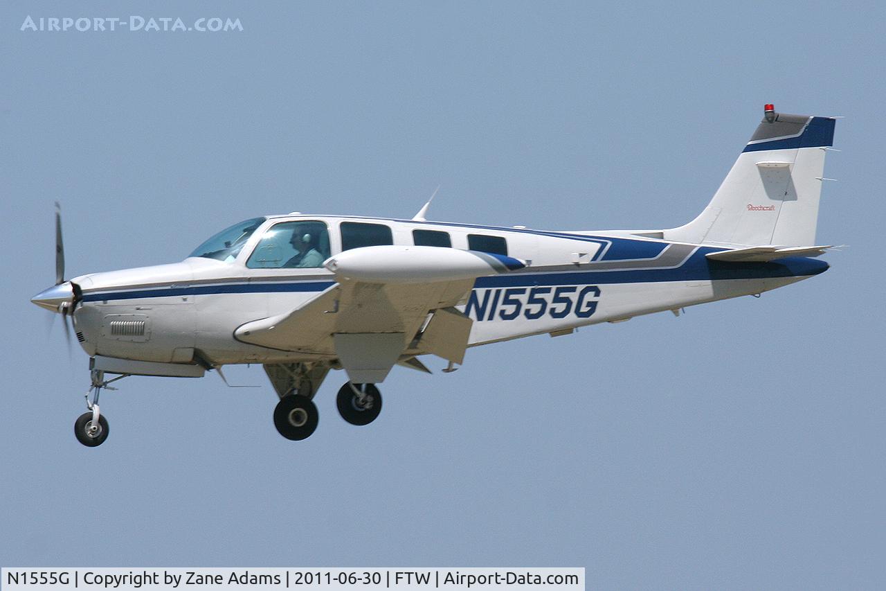 N1555G, 1989 Beech A36 Bonanza 36 C/N E-2500, Landing at Meacham Field - Fort Worth, TX
