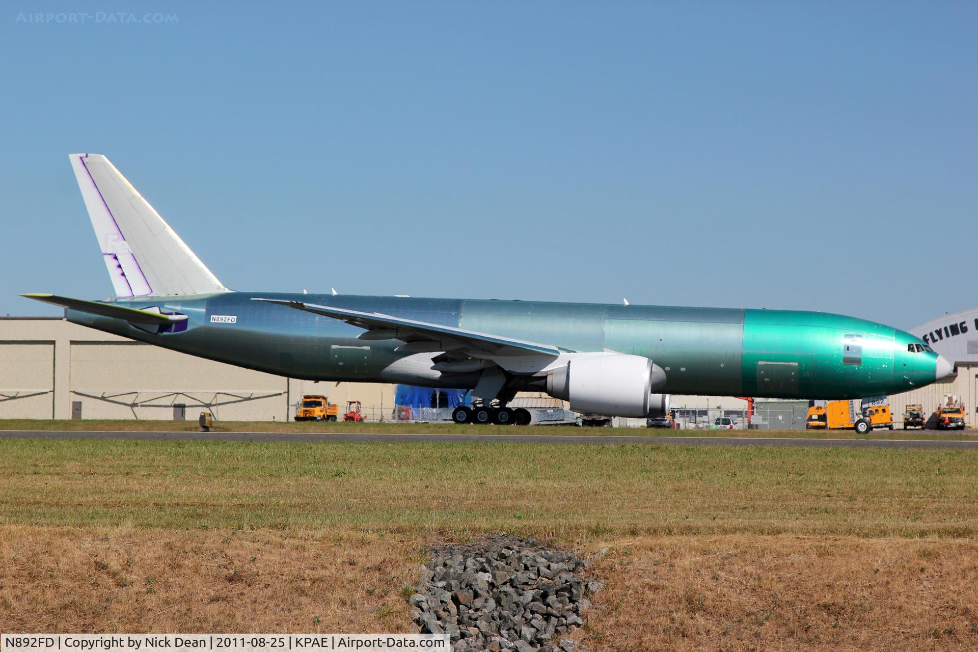 N892FD, 2011 Boeing 777-FS2 C/N 38707, KPAE/PAE Boeing 75 departing for first flight.