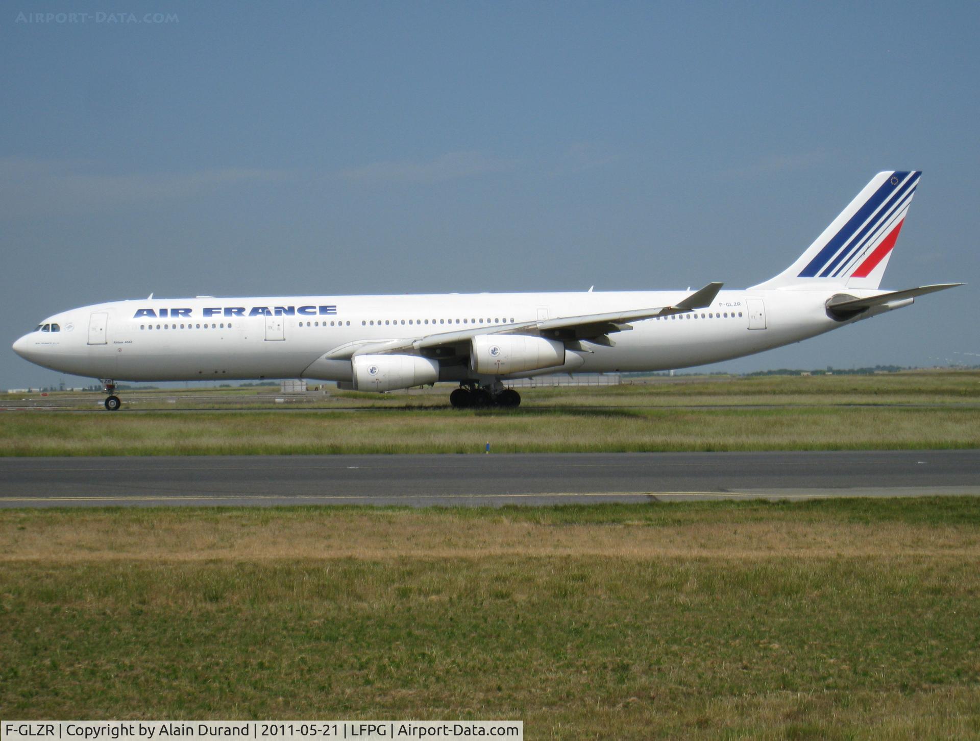 F-GLZR, 1999 Airbus A340-313X C/N 307, Time of departure and use of runway 09R in the north side hints a flight heading west/northwest, probably either Seattle or Toronto, both served by the Three-Forty's
