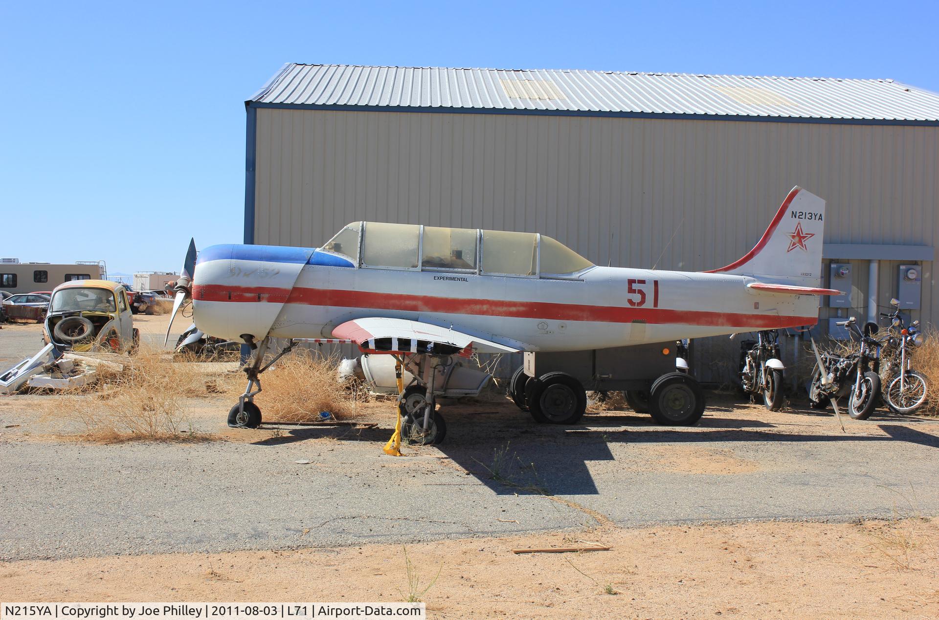 N215YA, 1990 Sukhoi Su-26 C/N 03-04, Waiting for her time.