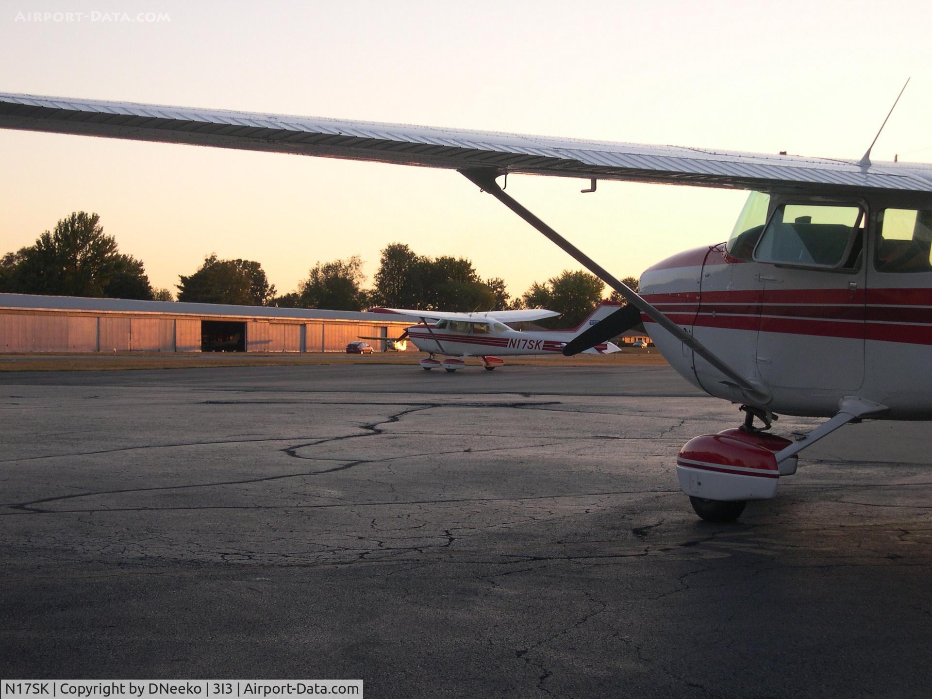 N17SK, 1980 Cessna 172N C/N 17273809, N25SK framing in N17SK with its wing.