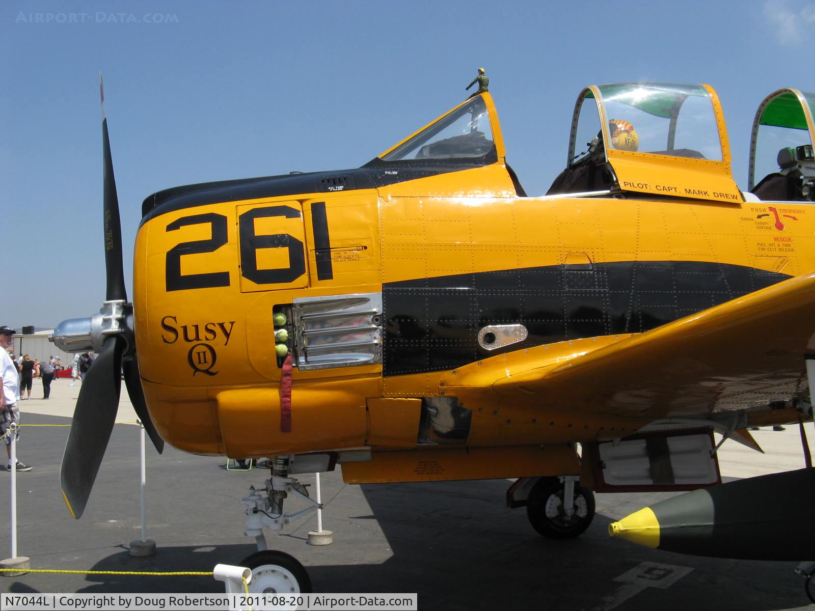 N7044L, 1955 North American T-28B Trojan C/N 200-286 (138215), 1955 North American T-28B TROJAN 'Susy Q', Wright R-1820-86 9 cylinder 1,425 Hp, in-service T-28s did not have the exhaust stacks mod and would burn off the fuselage paint over the wing