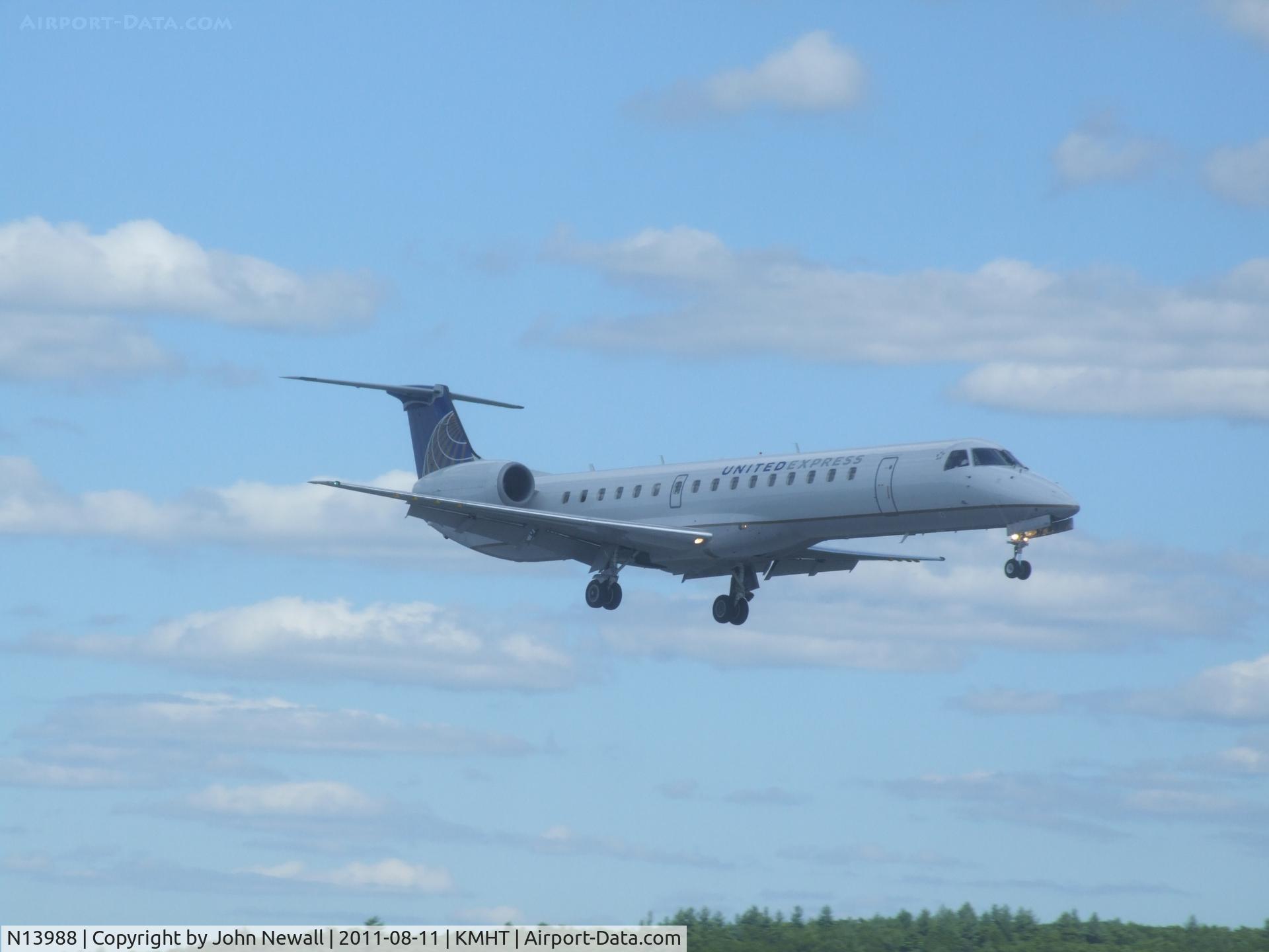 N13988, 2000 Embraer ERJ-145LR (EMB-145LR) C/N 145265, landing runway 24. United's new livery