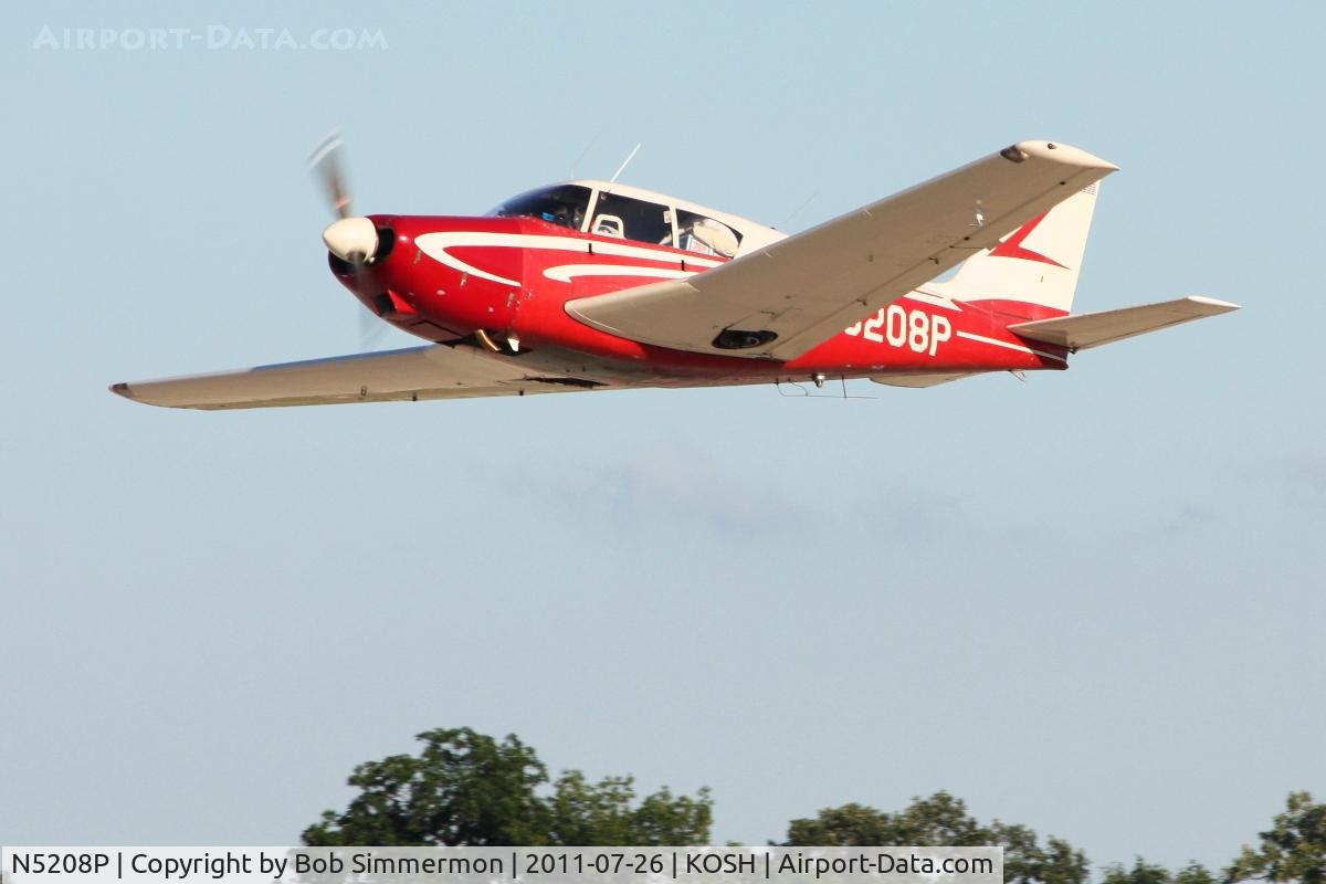 N5208P, 1958 Piper PA-24 Comanche C/N 24-232, Departing Airventure 2011.