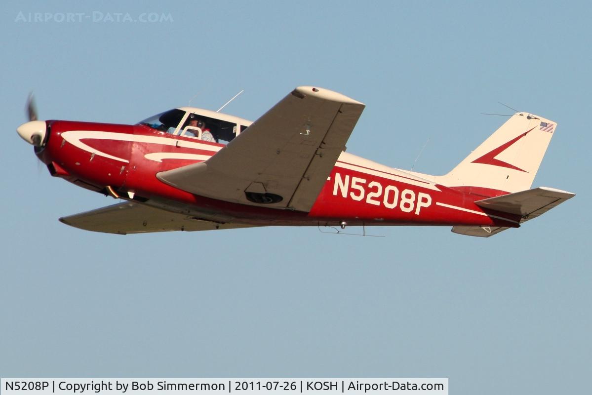 N5208P, 1958 Piper PA-24 Comanche C/N 24-232, Departing Airventure 2011.