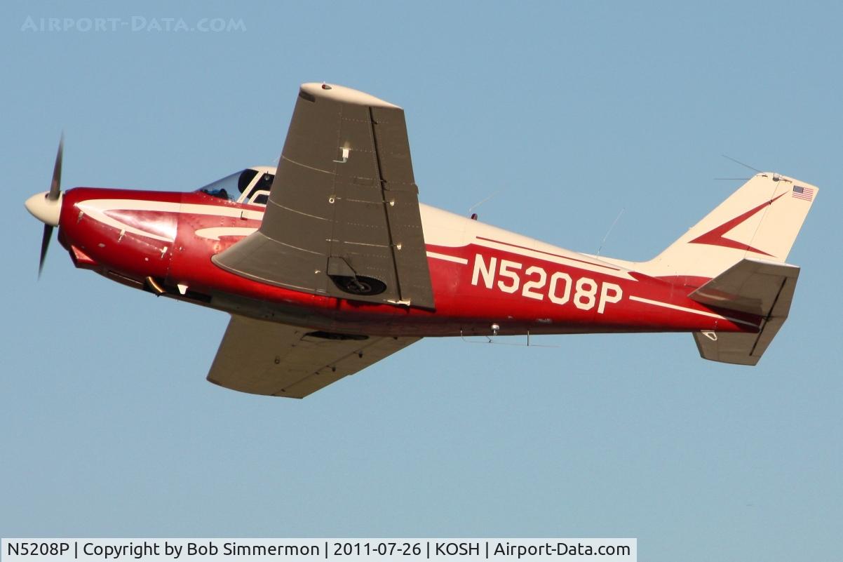 N5208P, 1958 Piper PA-24 Comanche C/N 24-232, Departing Airventure 2011.