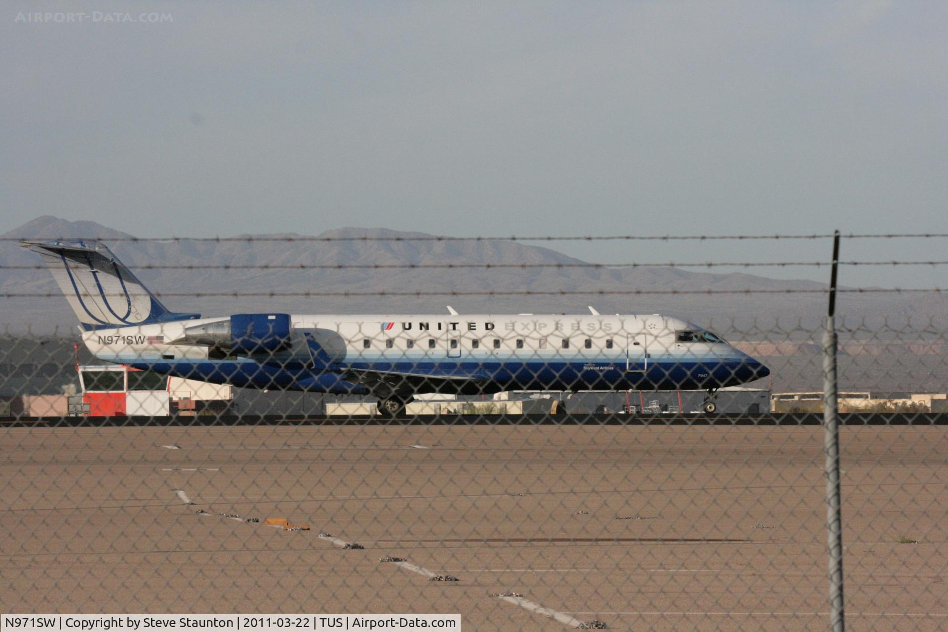 N971SW, 2004 Canadair CL-600-2B19 Regional Jet CRJ-200LR C/N 7947, Taken at Tucson International Airport, in March 2011 whilst on an Aeroprint Aviation tour