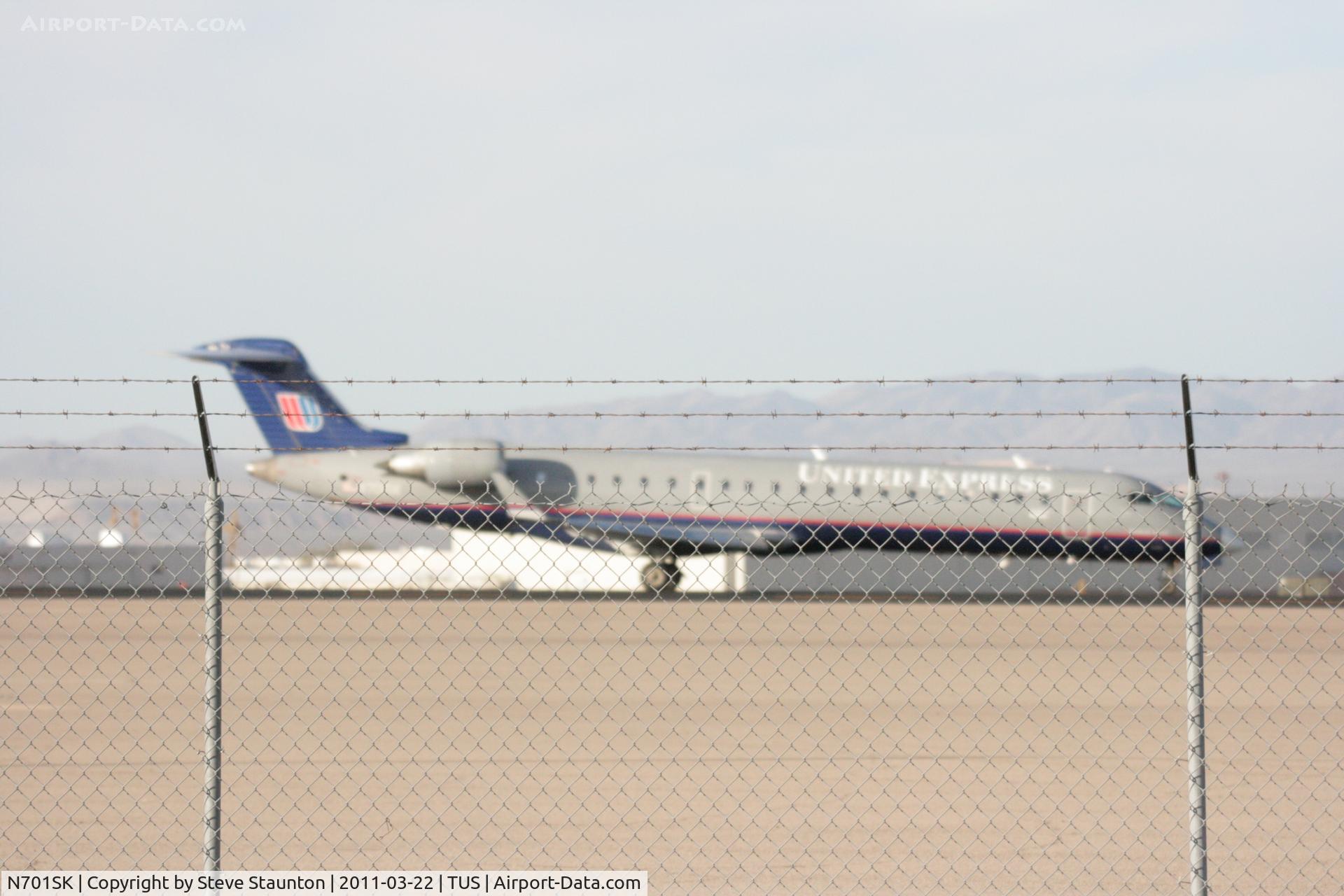 N701SK, 2004 Bombardier CRJ-700 (CL-600-2C10) Regional Jet C/N 10133, Taken at Tucson International Airport, in March 2011 whilst on an Aeroprint Aviation tour