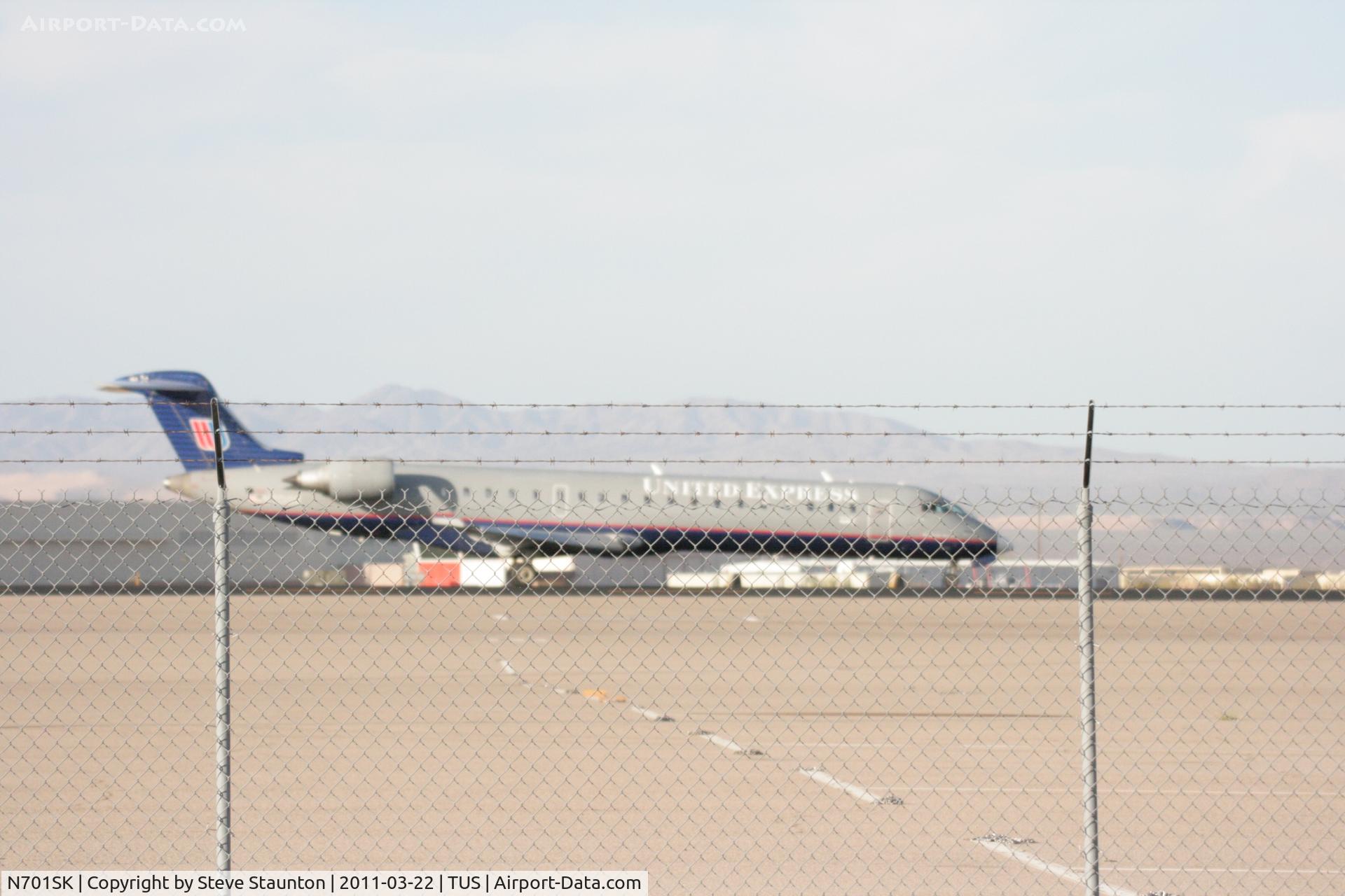 N701SK, 2004 Bombardier CRJ-700 (CL-600-2C10) Regional Jet C/N 10133, Taken at Tucson International Airport, in March 2011 whilst on an Aeroprint Aviation tour