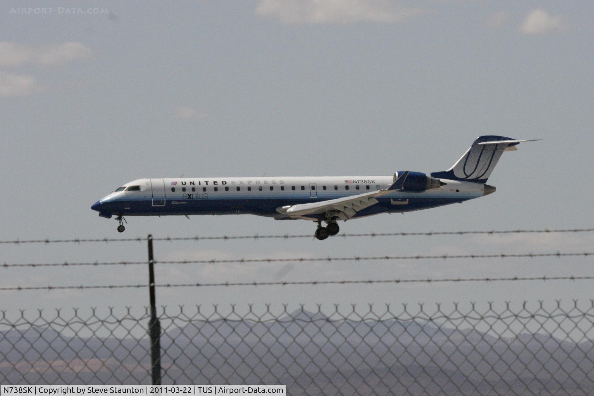 N738SK, 2005 Bombardier CRJ-700 (CL-600-2C10) Regional Jet C/N 10195, Taken at Tucson International Airport, in March 2011 whilst on an Aeroprint Aviation tour