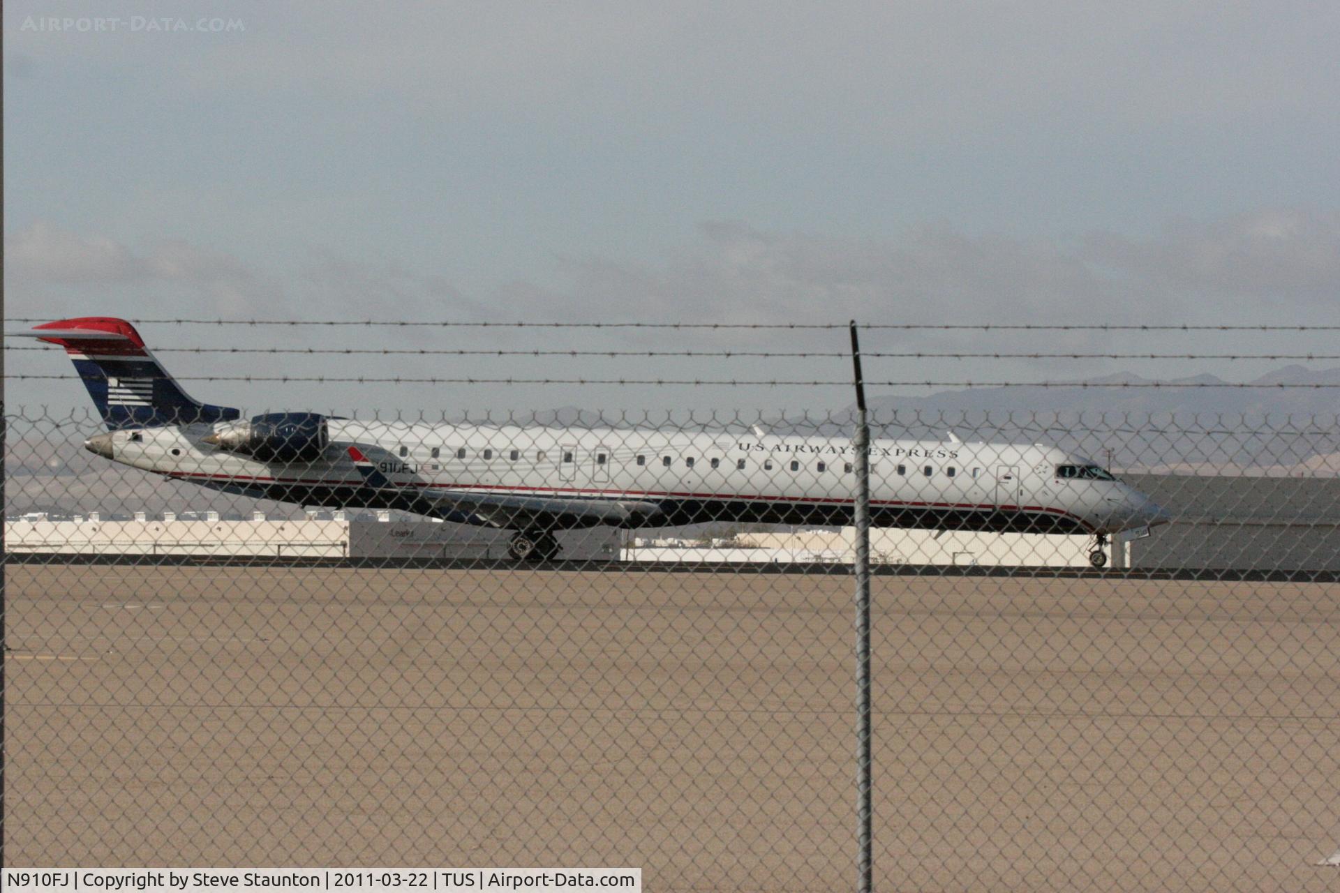 N910FJ, 2003 Bombardier CRJ-900ER (CL-600-2D24) C/N 15010, Taken at Tucson International Airport, in March 2011 whilst on an Aeroprint Aviation tour
