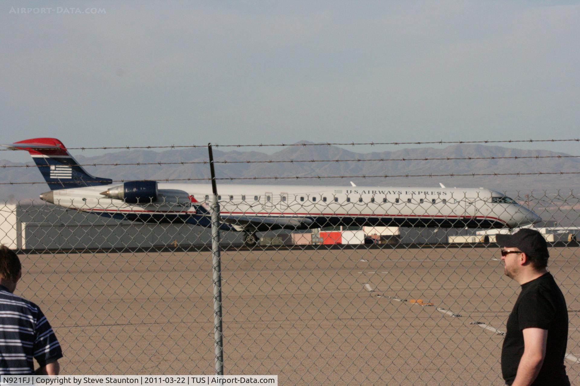 N921FJ, 2004 Bombardier CRJ-900ER (CL-600-2D24) C/N 15021, Taken at Tucson International Airport, in March 2011 whilst on an Aeroprint Aviation tour