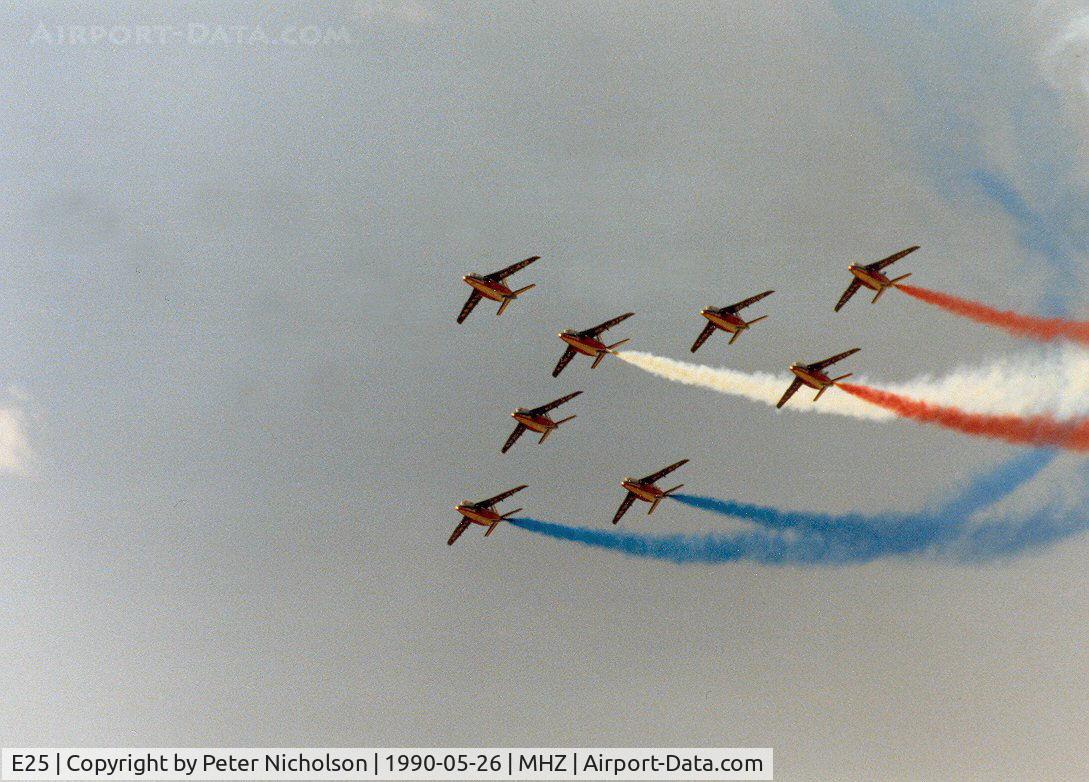 E25, Dassault-Dornier Alpha Jet E C/N E25, Alpha Jet number 1 of the Patrouille de France aerobatic display team leading the team in their display at the 1990 RAF Mildenhall Air Fete.