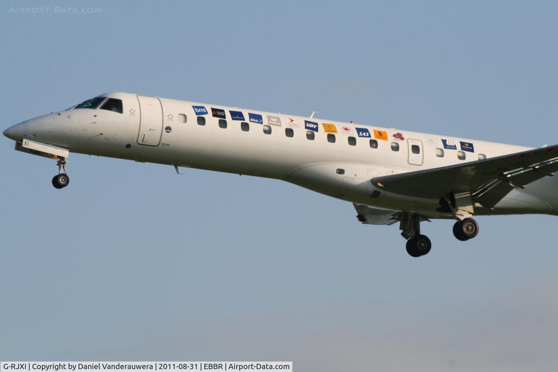 G-RJXI, 2001 Embraer EMB-145EP (ERJ-145EP) C/N 145454, Arrival of flight SN2188 to RWY 25L  (decals change)