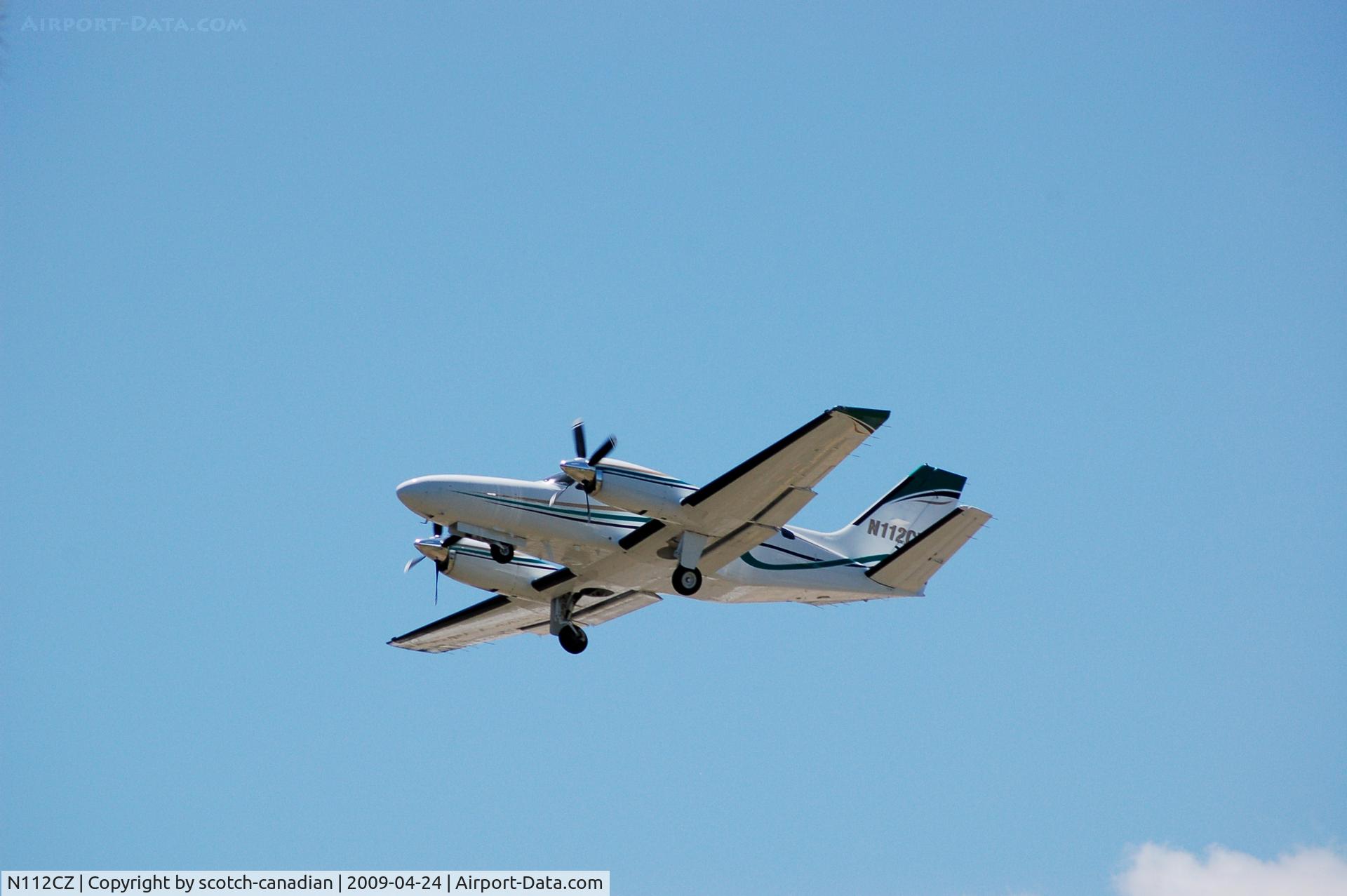 N112CZ, 1981 Cessna 441 Conquest II C/N 441-0233, 1981 Cessna 441 Conquest II N112CZ departs Palm Beach County Park Airport at Lantana, FL