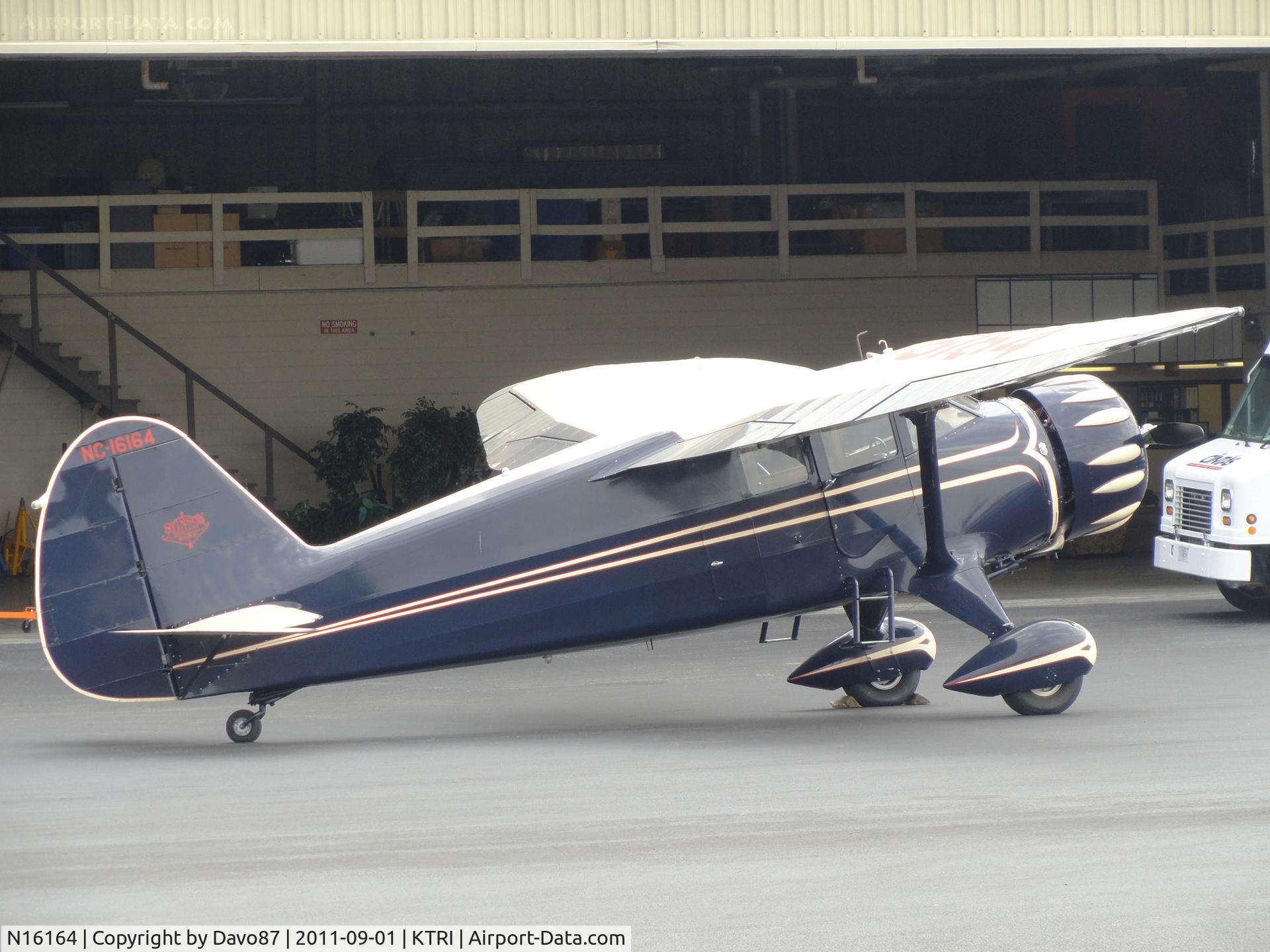 N16164, 1936 Stinson SR-8E Reliant C/N 9737, Stinson Reliant parked outside hanger at Tri-Cities Airport (KTRI) in Blountville, TN on September 1, 2011.