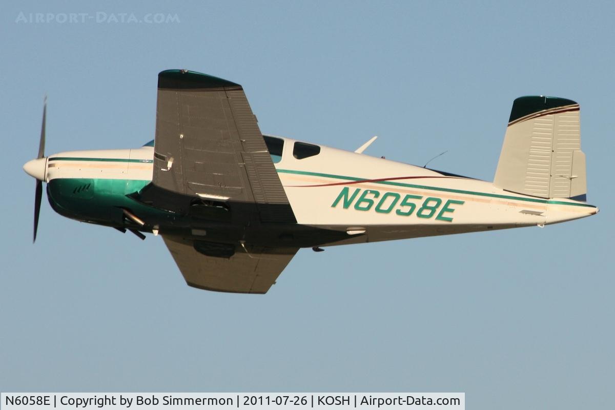 N6058E, 1959 Beech K35 Bonanza C/N D-6025, Departing Airventure 2011.