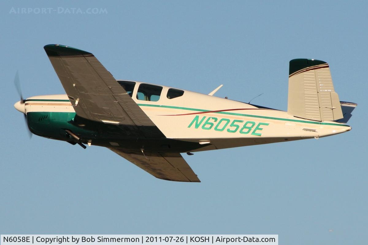 N6058E, 1959 Beech K35 Bonanza C/N D-6025, Departing Airventure 2011.