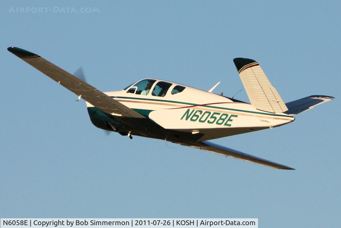 N6058E, 1959 Beech K35 Bonanza C/N D-6025, Departing Airventure 2011.